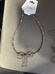 Orange Spiny Bow necklace