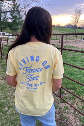 Living On Farmer Time Graphic Tee in Butter Yellow