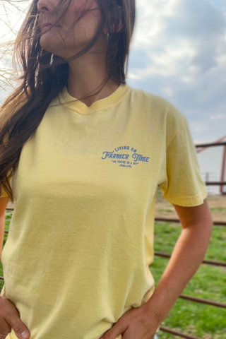 Living On Farmer Time Graphic Tee in Butter Yellow