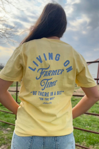 Living On Farmer Time Graphic Tee in Butter Yellow